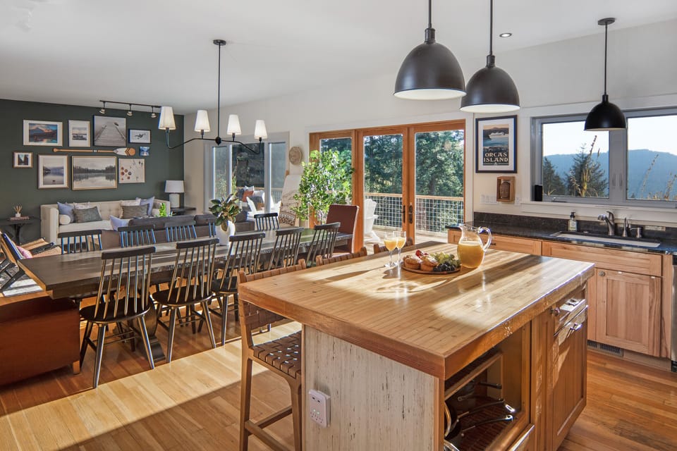 Cook in our fully equipped kitchen with open floor plan and deck access