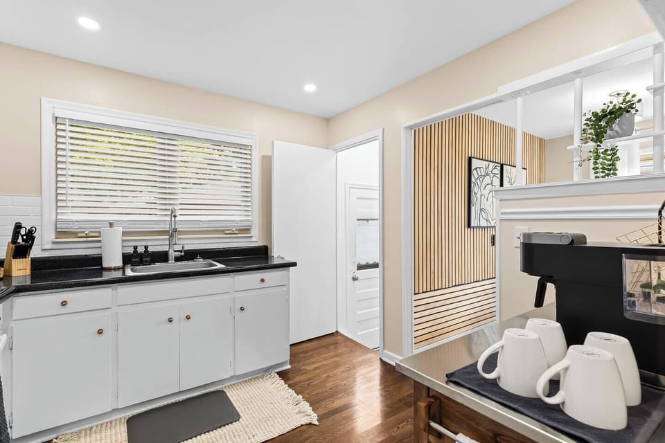 The kitchen is also well-lit and spacious, making it a pleasant place to spend time.