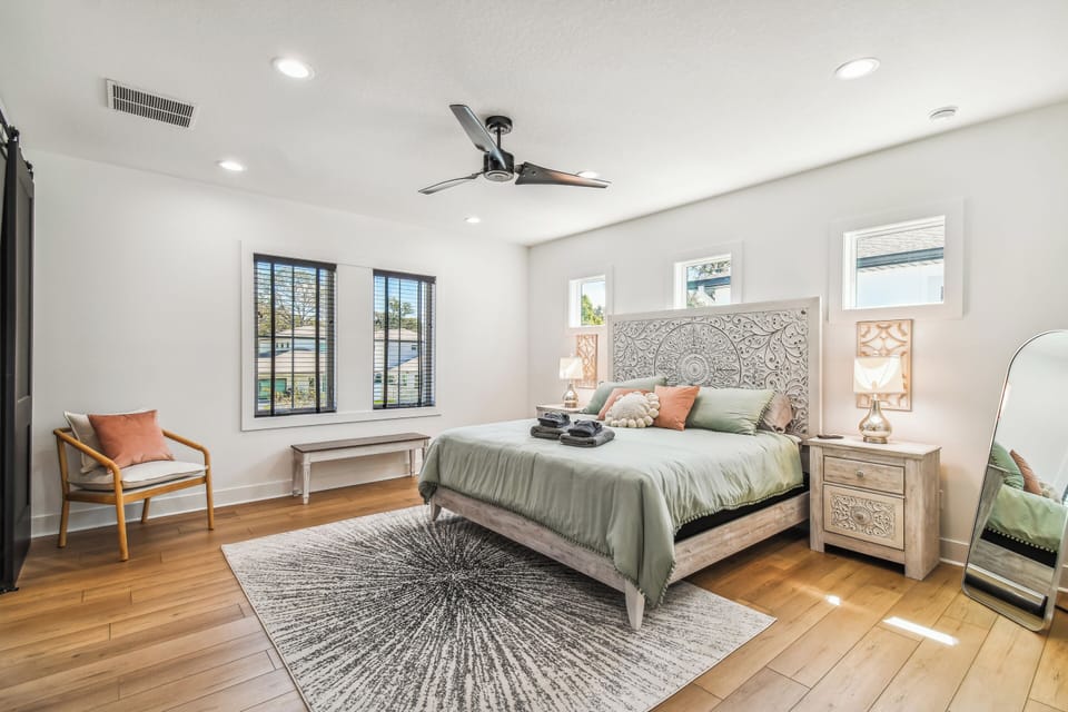 Huge, primary bedroom. Featuring en-suite, walk-in closet, 55 in smart TV