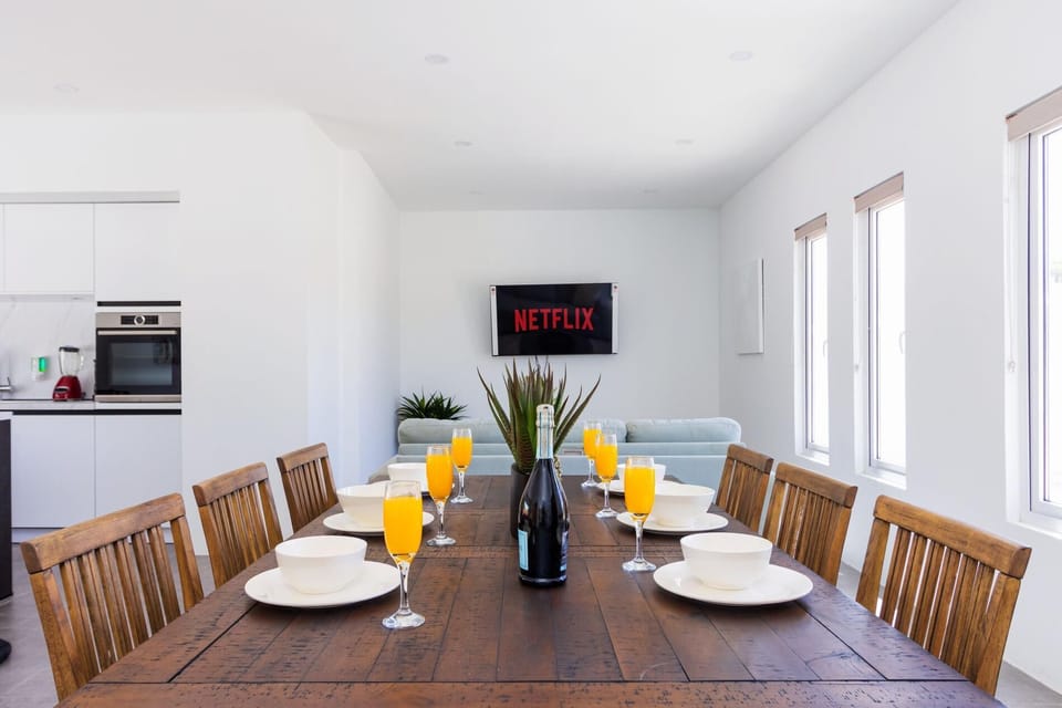 Cherish the moments: Make lasting memories around the table in this welcoming Airbnb dining space.