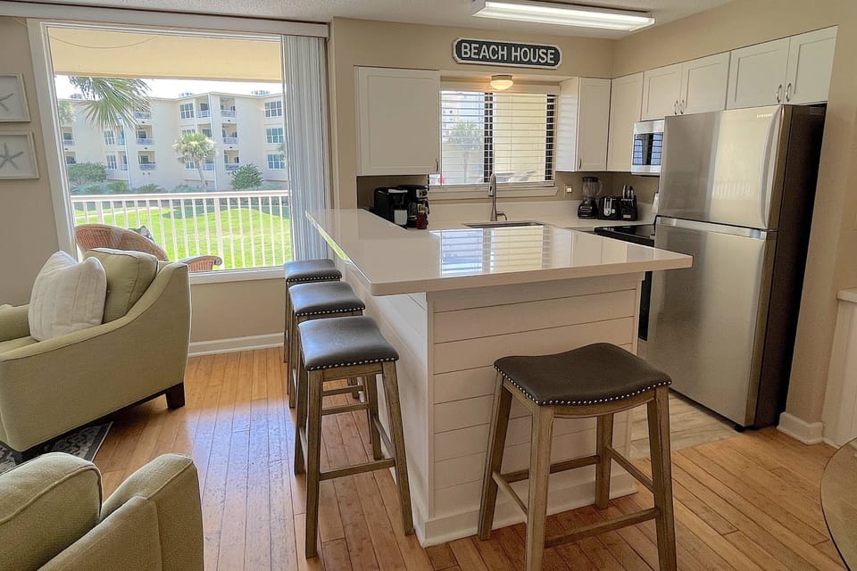 Counter Seating for (4) with Views of the Greenway along with Views of the Water