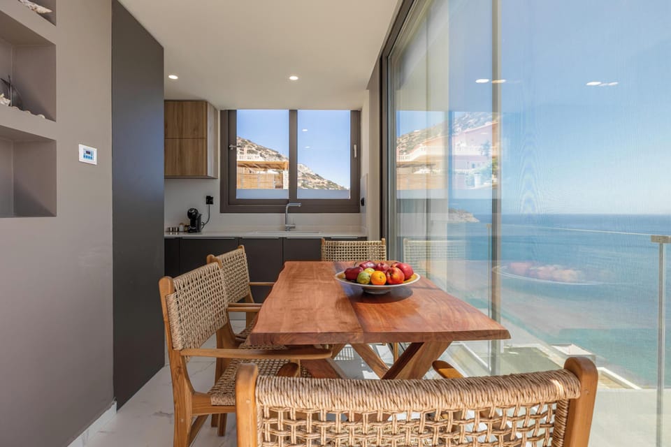 A fully equipped kitchen with modern amenities and a charming dining area for 4!