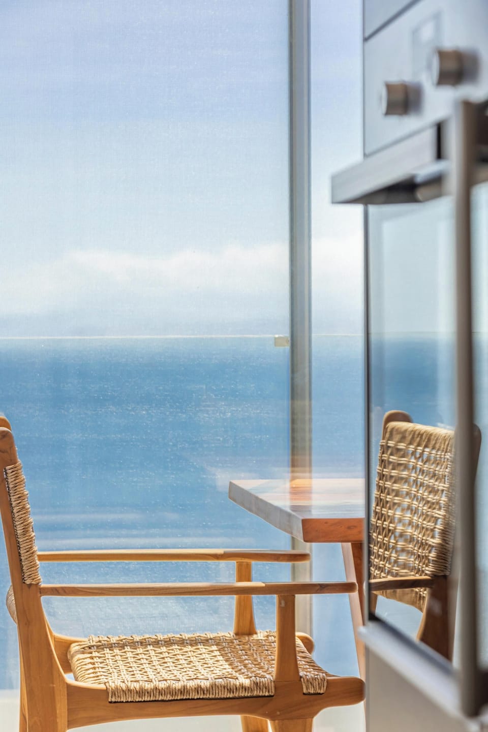 Juliette balcony, offering awe-inspiring views of the shimmering sea!