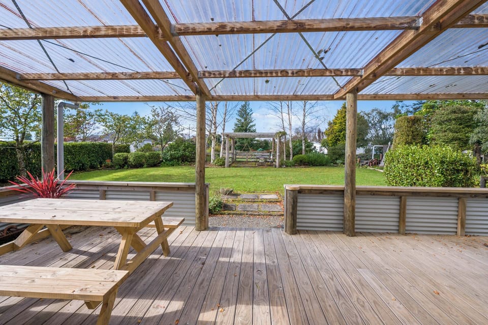 Covered deck off kitchen, full afternoon sun