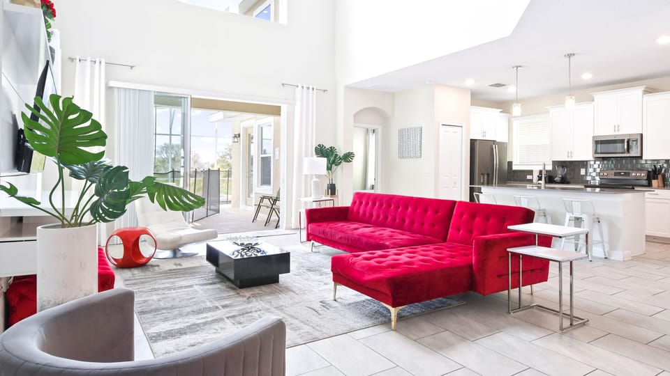 Enjoy quality time with loved ones in our inviting living room, offering a cozy space for relaxation.