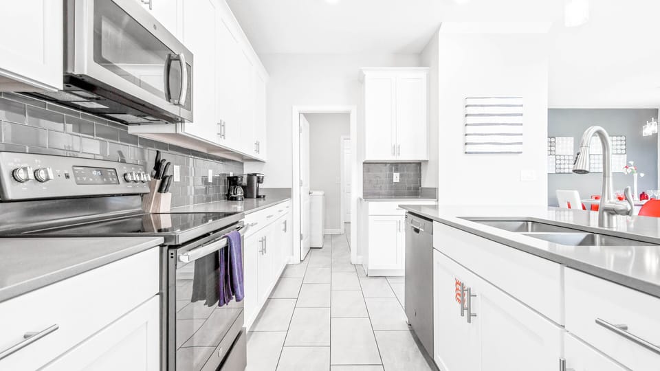 Unleash your inner chef in our modern kitchen, complete with top-of-the-line appliances for your convenience.