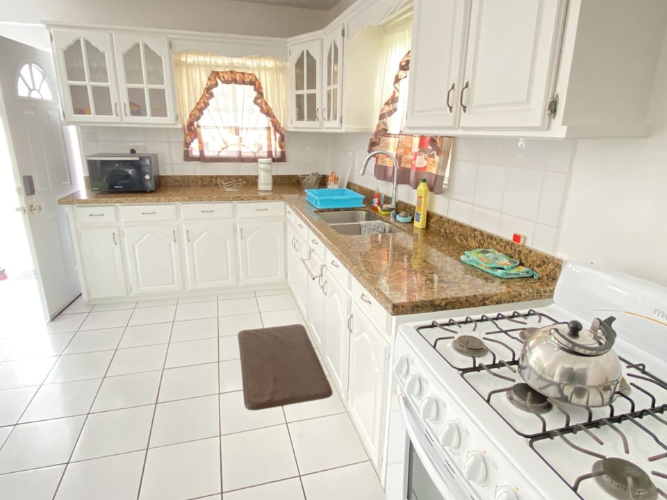 Kitchen with some basic starter amenities to prepare your meals
