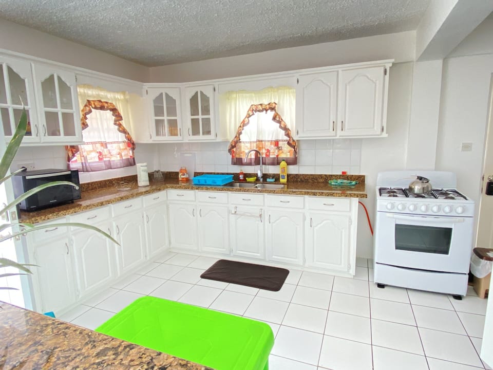 Kitchen with some basic starter amenities to prepare your meals