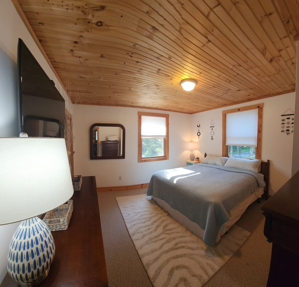Enjoy late night TV in upstairs BR #1 w/king bed (sleeps 2), with ample storage.