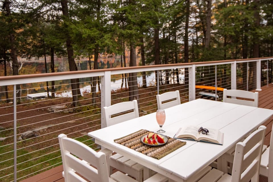 Enjoy a book immersed in nature, or al fresco dining (6-person Polywood Table)!