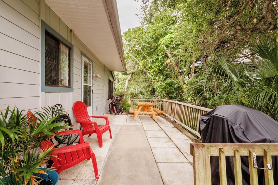 Walkway from Happy Hours II towards Happy Hours II with private  picnic table