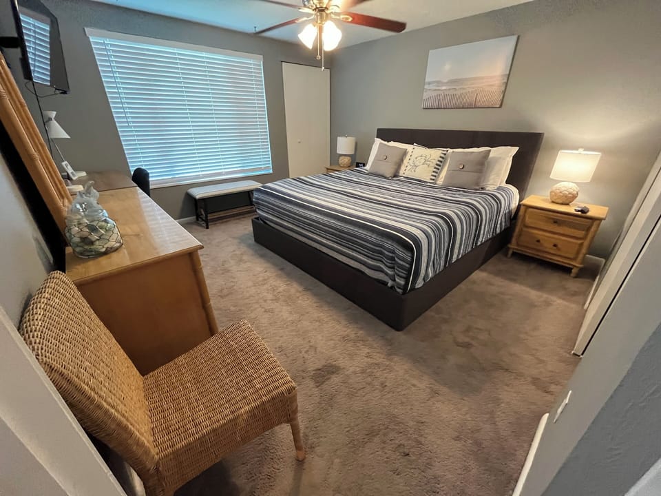 Happy Hours II (front unit) downstairs bedroom with king bed