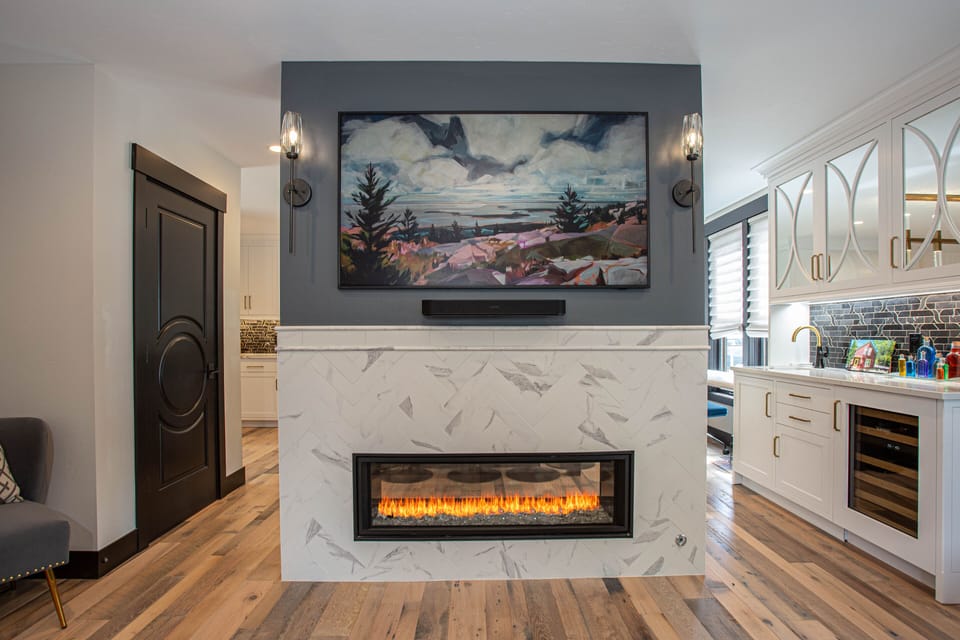Double sided fireplace and Frame Art TVs