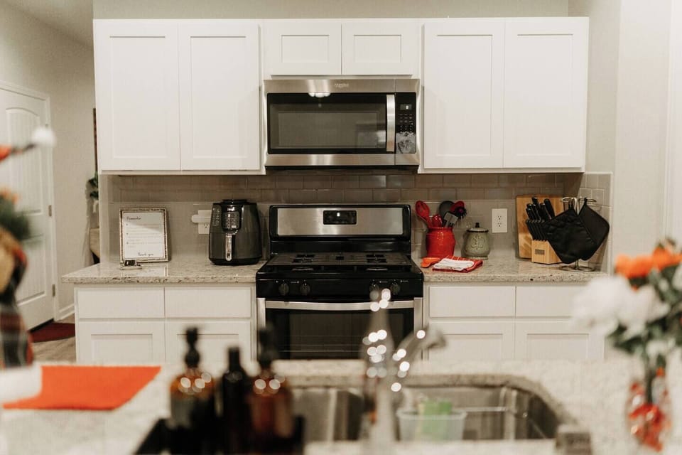 Stay at the best Airbnb in Lake Charles! This modern home, built after 2020, features a large island that creates a great option for dining in a less formal setting, just 2 miles from a newly developed golf course.
