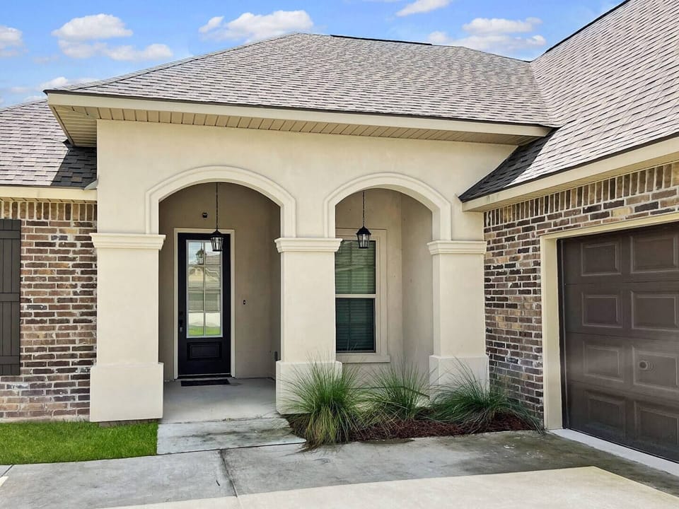 Your private entrance is conveniently located near the exterior of the two-car garage. It is equipped with security cameras, lighting, and smart locks, ensuring a safe and hassle-free stay.