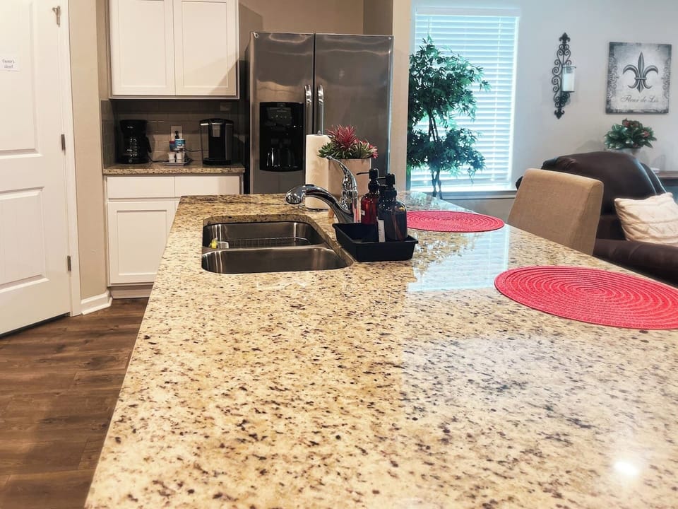 Book the best Airbnb in Lake Charles! The large island provides a perfect spot for casual dining, and the home is equipped with both a Keurig coffee pot and a drip coffee maker for your morning convenience.