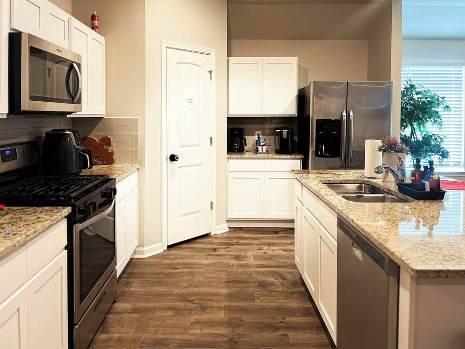 Stay at the best Airbnb in Lake Charles! The convenient full kitchen is equipped with all the essentials for home-cooked meals and offers plenty of storage for long-term stays.