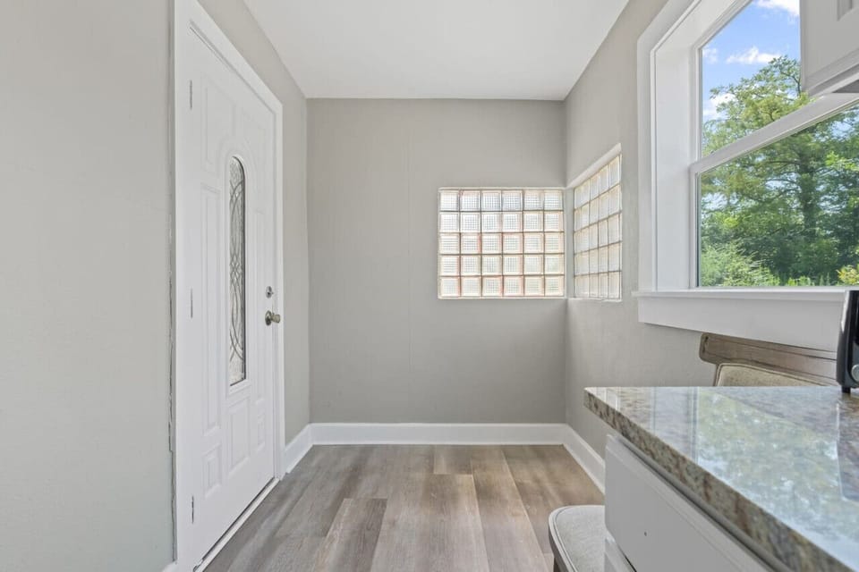 Bright and welcoming entryway with plenty of natural light to greet you as you arrive