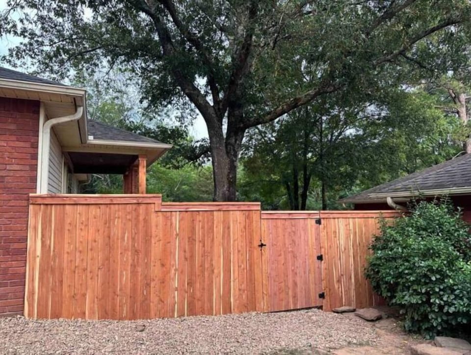 Privacy fence leading to Guesthouse Meditation Garden and front door