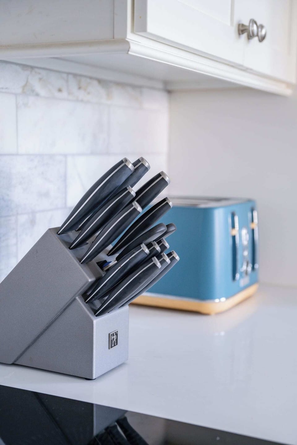 Details matter—this stocked kitchen features Henckels knives and curated essentials to make cooking here feel easy and elevated.