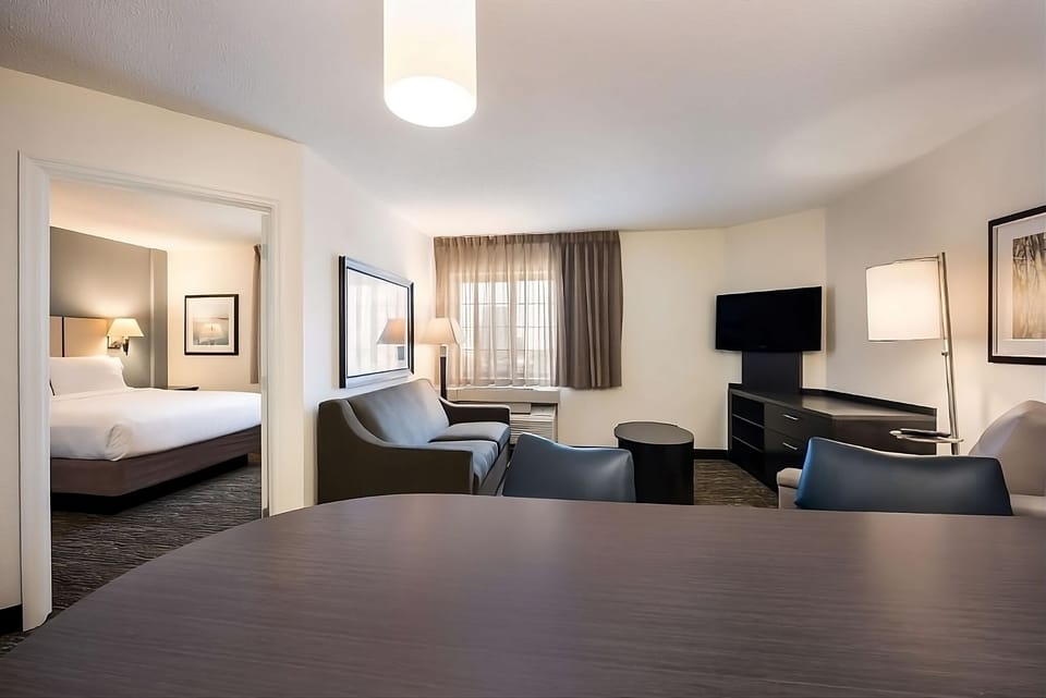Relax in the spacious suite living area with entertainment.