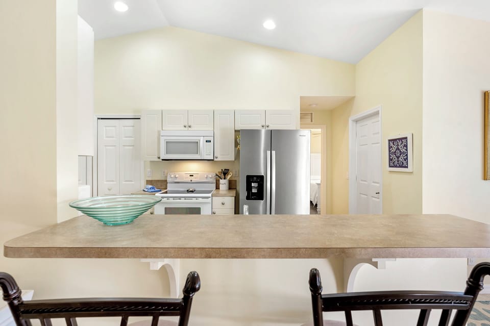 Eating bar, view into kitchen