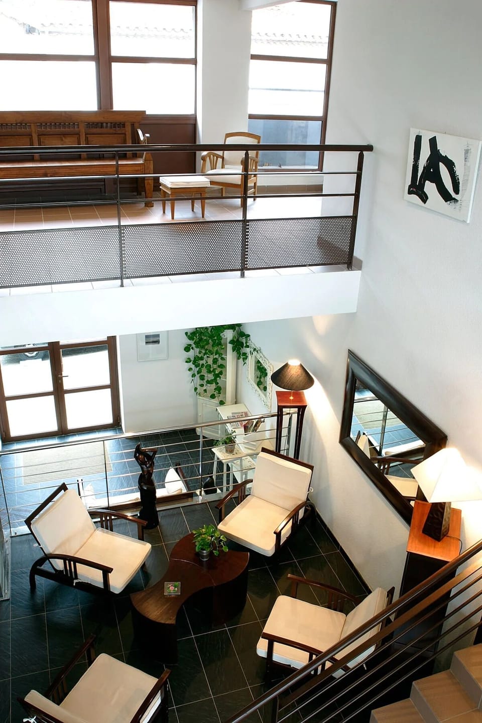 Unwind in the airy lounge with comfortable seating and light.