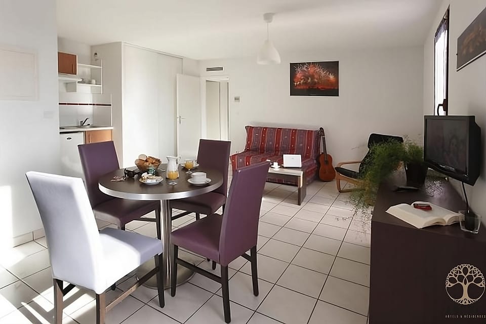 Settle in with breakfast at the table and relax on the sofa.