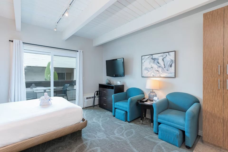 Spread out in an airy studio with seating and outdoor access.