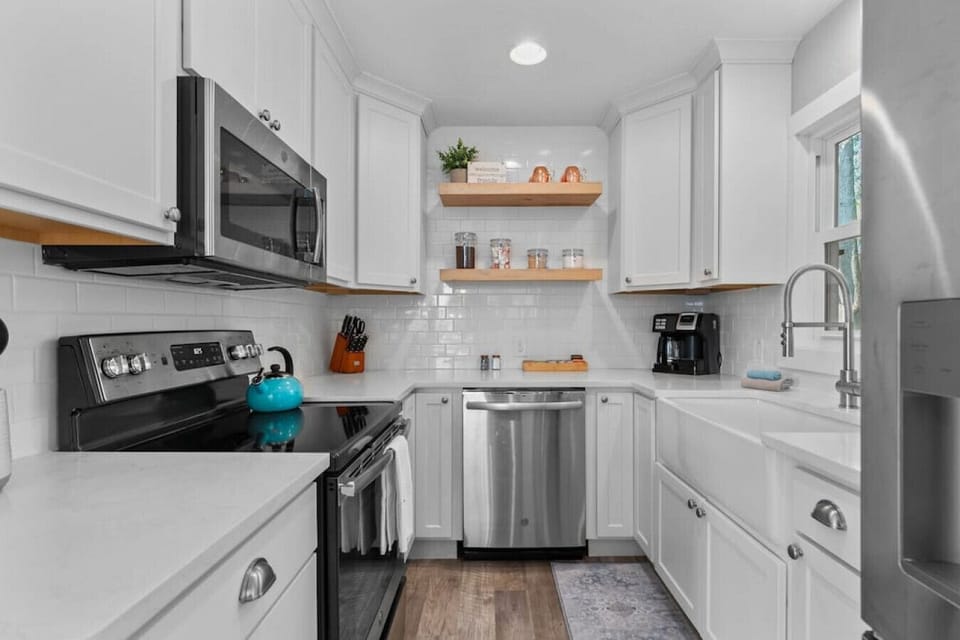 The kitchen is fully stocked with hand towels, wash cloths, pots & pans, cooking utensils, dishware, silverware, cooking oil and basic spices.