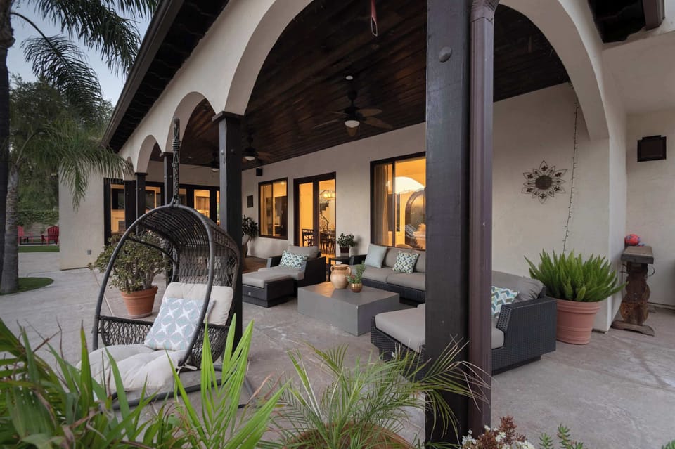 The covered outdoor area perfect for relaxing and watching the backyard fun!