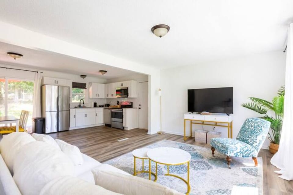 Spacious Living Area Seamlessly Blending with Kitchen and Dining Space, Offering Serene Ambiance