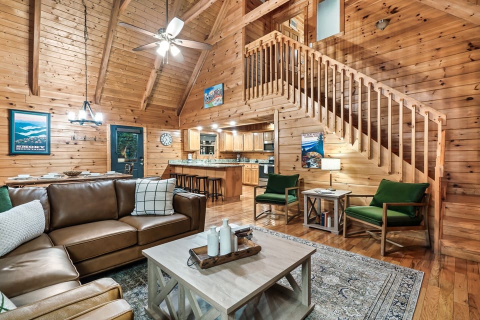 View of main floor living area leading to the upstairs master bedroom