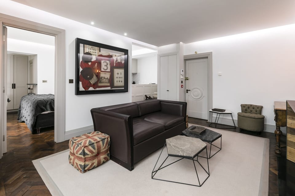 The lounge area leads through to the kitchen and bedroom