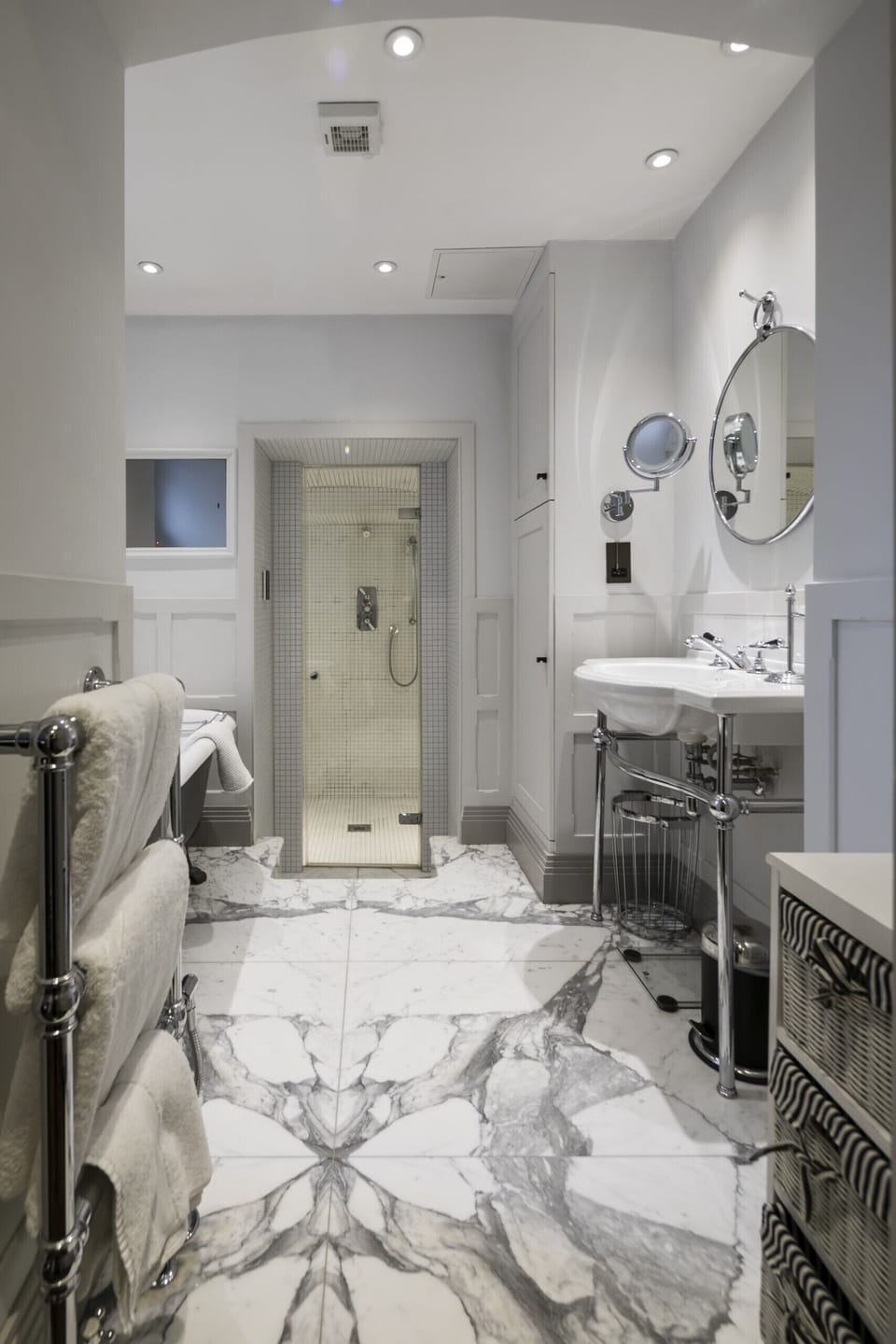 Complete with roll top bath, mirror TV, steam shower room, heated flooring and luxury, fluffy bath towels.