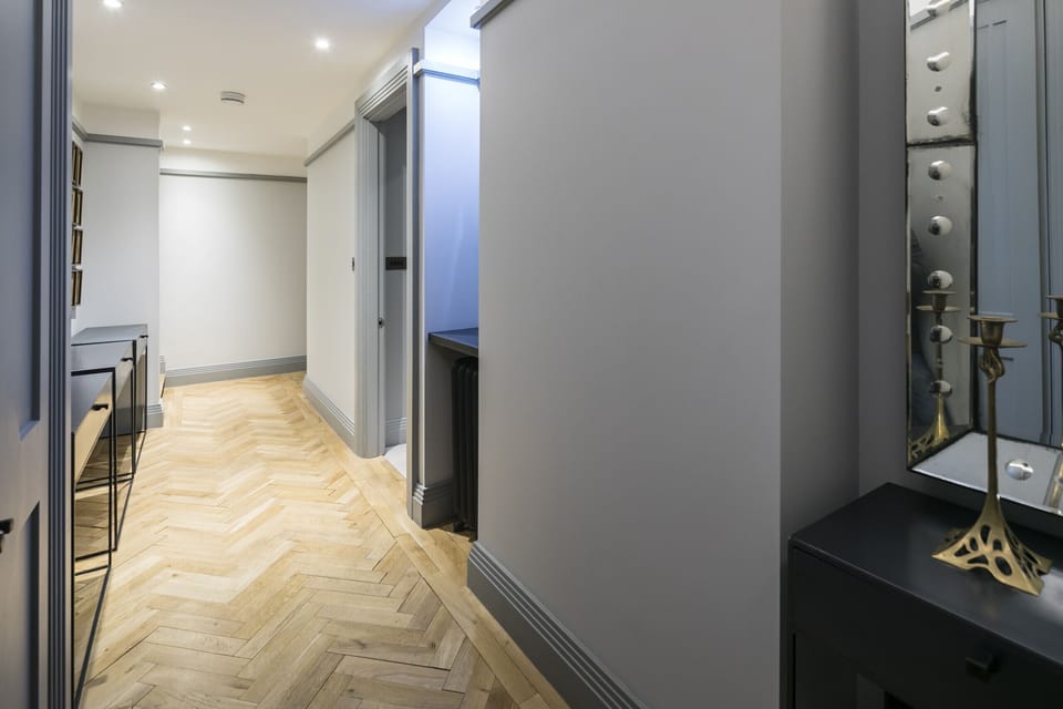 Wide corridor leading to the bedroom & living room