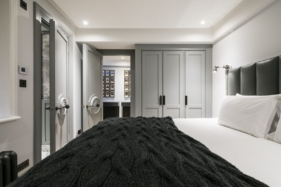 This master bedroom includes full length fitted wardrobes and a flat screen TV