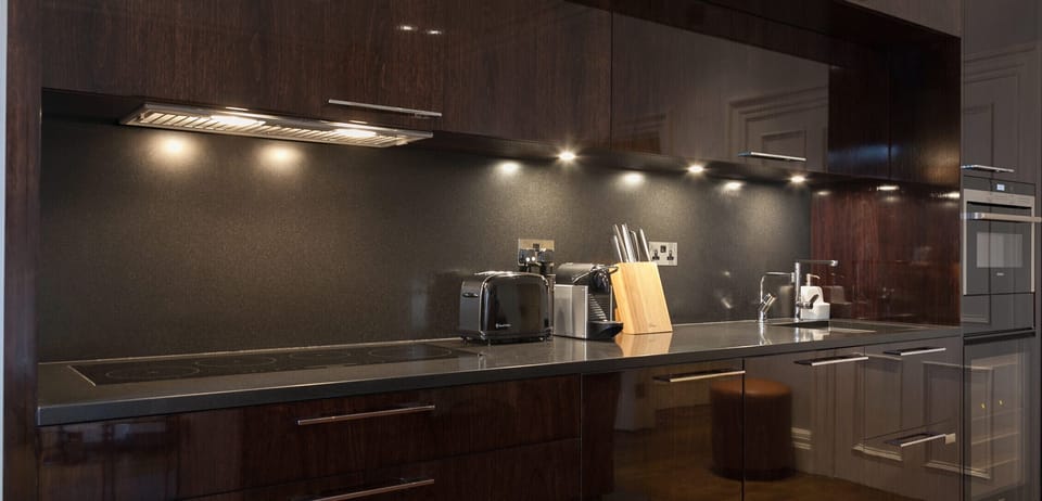 A fully fitted kitchen with fridge, freezer, dishwasher, hot tap & washer & intergrated dryer.