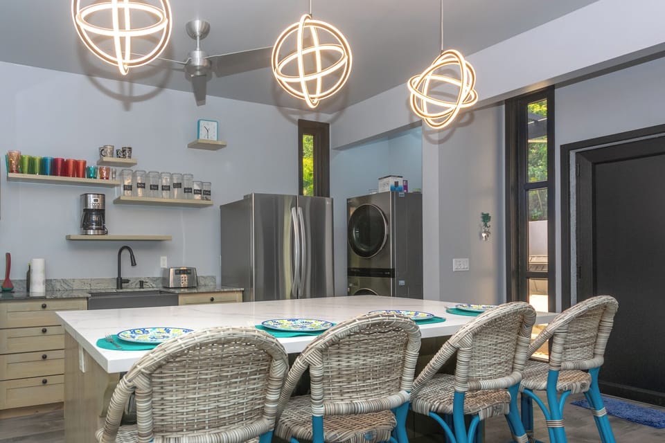 Washer/dryer by kitchen