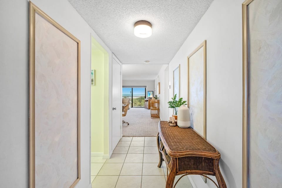 Entryway leading to the living area, offering a welcoming ambiance.
