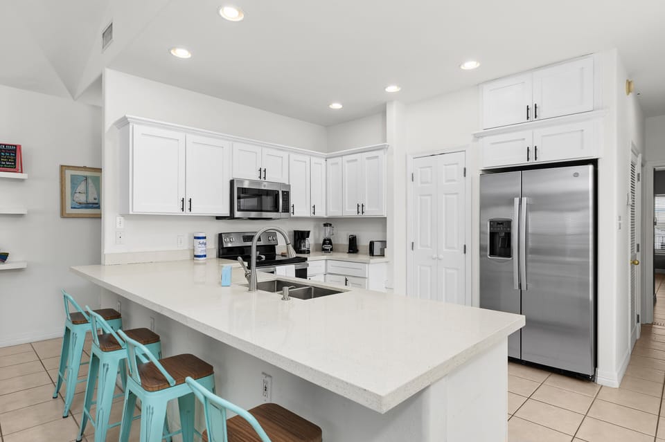Kitchen is fully stocked with the pots, pans, and dishware you'll need to prepare home cooked meals.