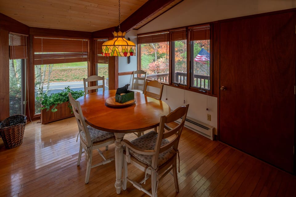 Cozy breakfast nook with a charming view, perfect for morning coffee.