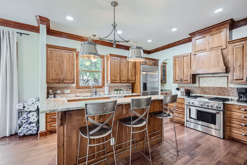 Fully equipped kitchen with modern appliances.