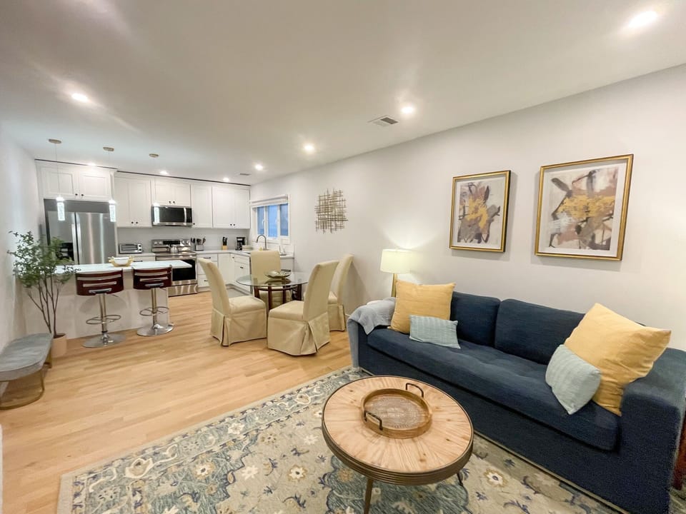 Living room to the dining area. wide open space great for whatever activities you want to do