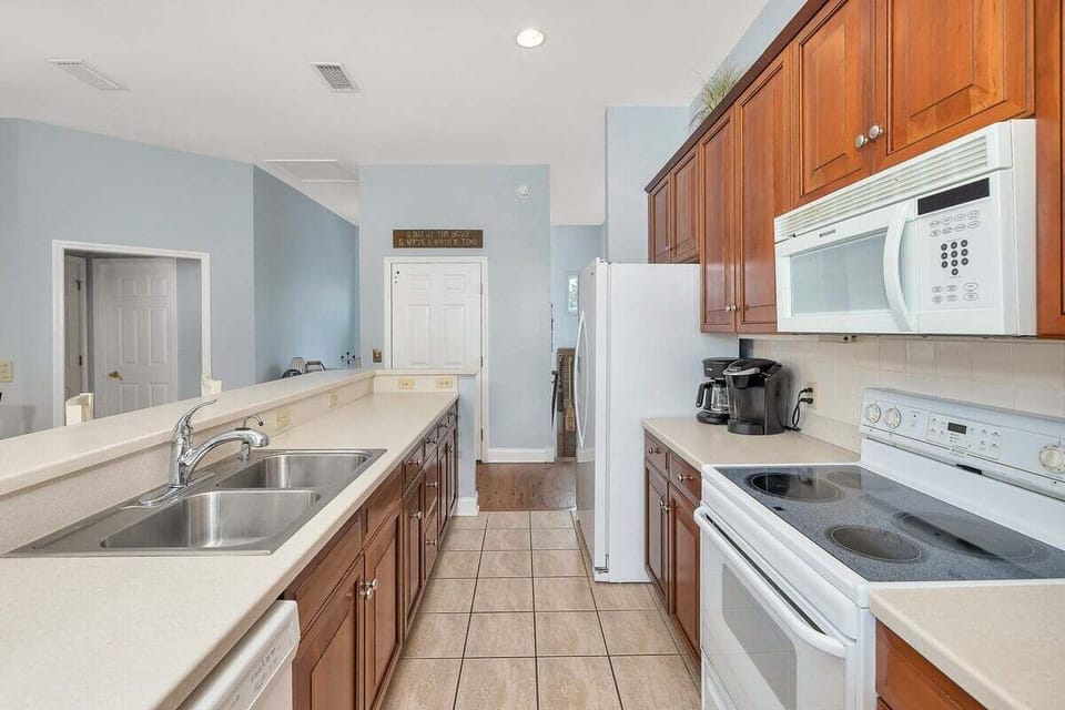 Kitchen with wooden tone cabinetry