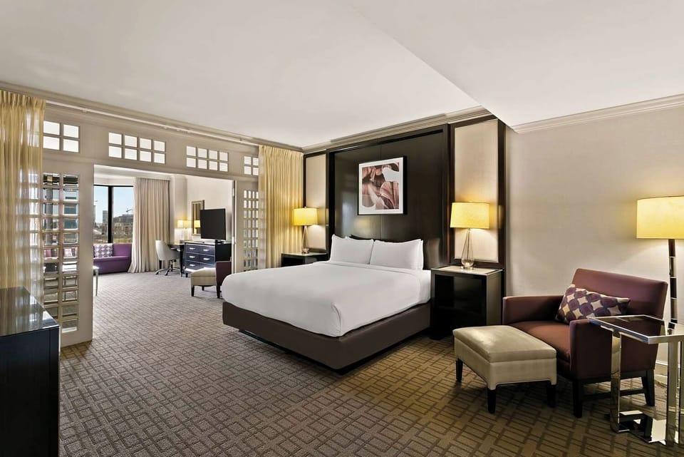 Settle into a spacious room with lounge seating and sleek furnishings.