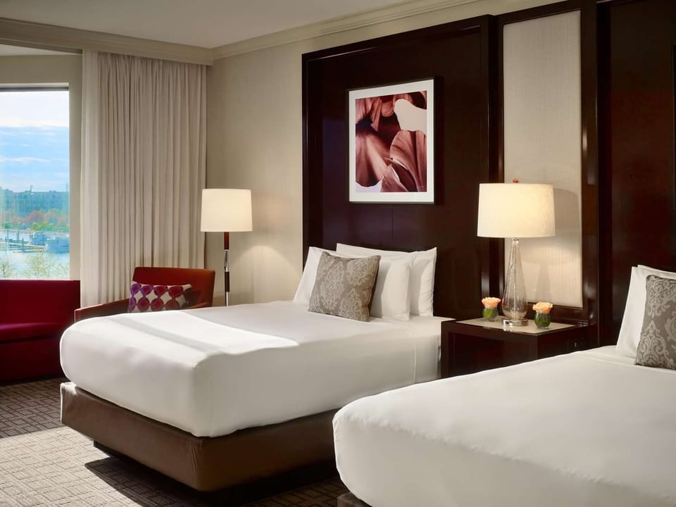 Unit with 2 Queen beds. Exact unit will be assigned upon arrival. Views, colors, and decor may vary.