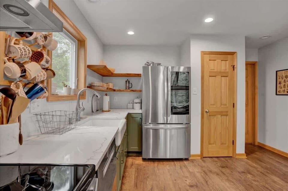 Counter space and large sink with a pantry