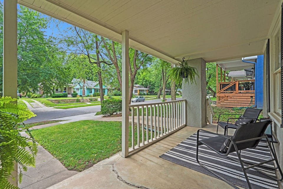 Inviting wraparound-style porch overlooking quiet, tree-lined streets—perfect for morning coffee or relaxing after a day exploring Brookside and nearby shops.