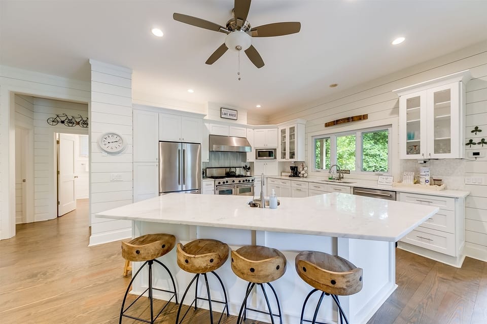 Large kitchen island with 4 stools